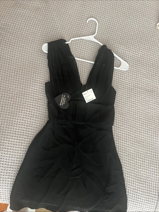 bebe Dresses & Skirts - bebe Black Plunging V-Neck Mini Dress